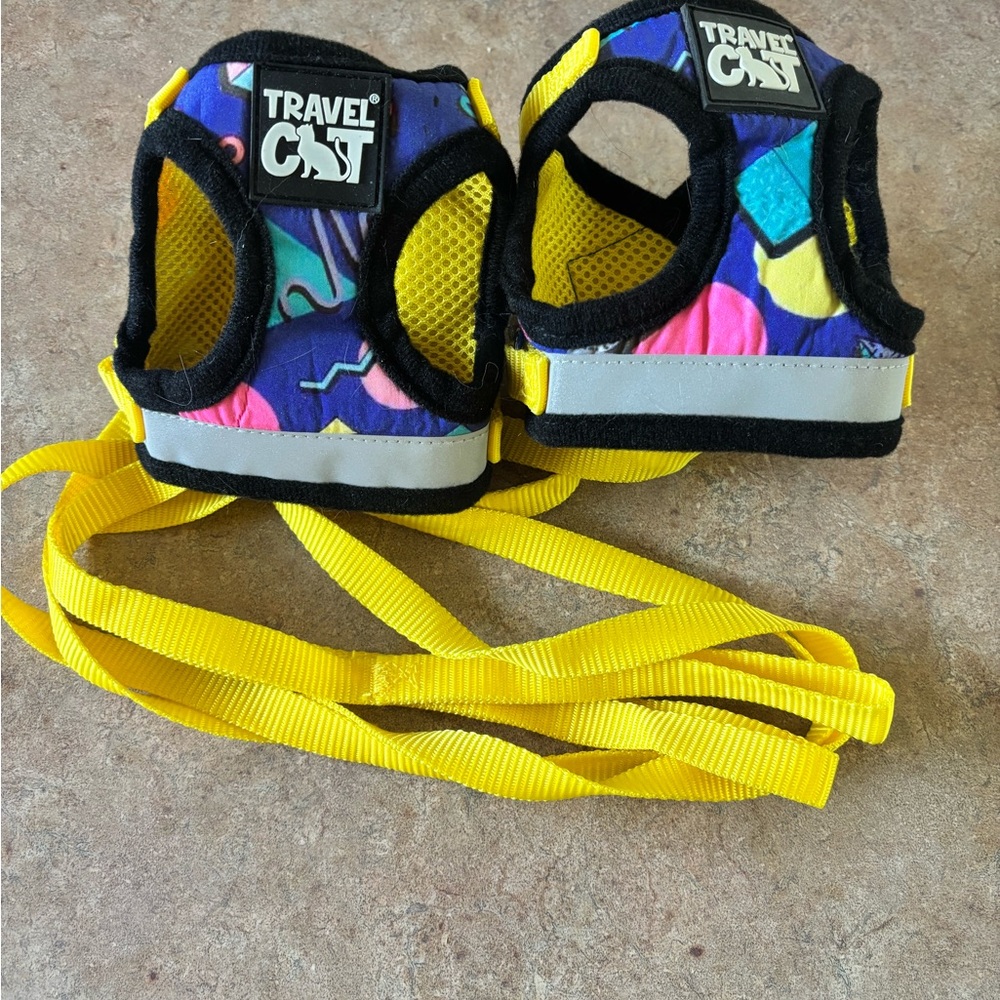 Two Harness and Leash Sets - Black, Yellow, and Multicolor